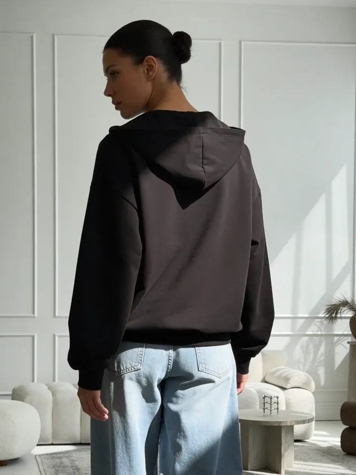 Back view of the hood on the black NAZZANI hoodie