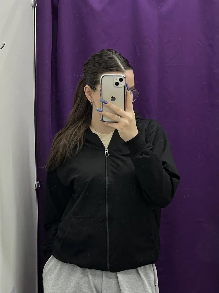 Customer look with a black NAZZANI hoodie